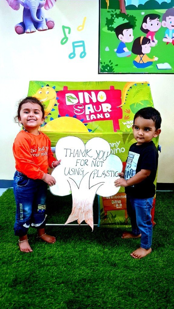 Children with eco awareness tree poster