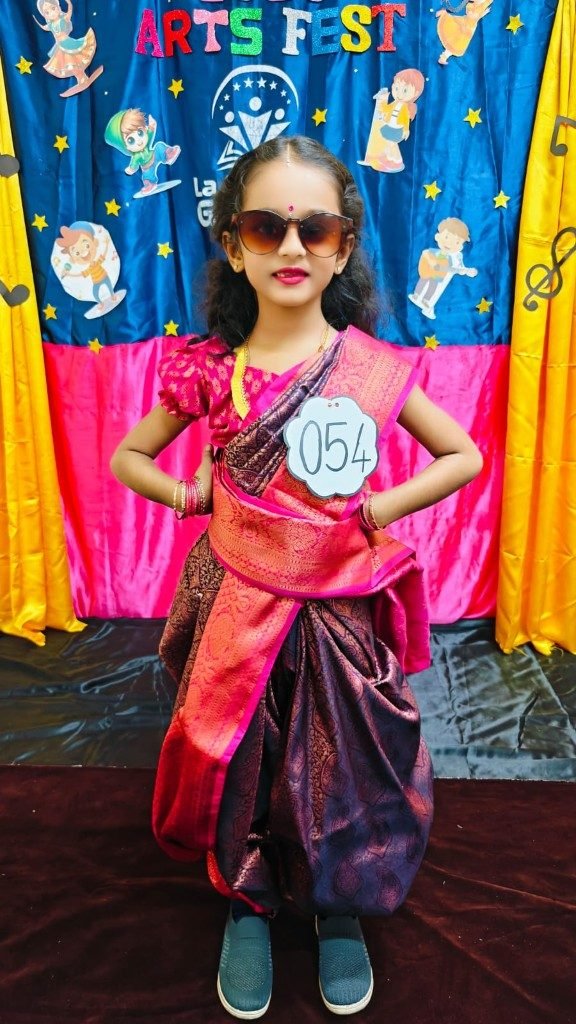 Grade 1 girl in traditional sari costume at Arts Fest 2026